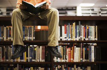 Man Studying in Library